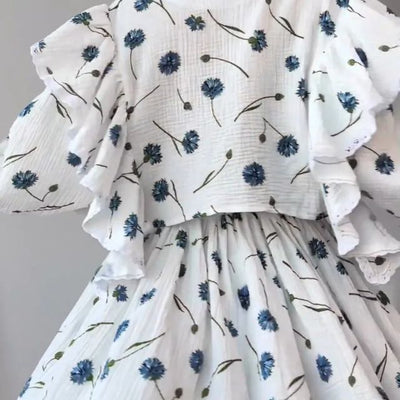 Liana - Sød kjole med pufærmer og blomsterbroderi