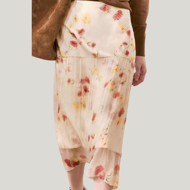 Delilah - plisseret midi-nederdel med blomsterprint i pastelfarver
