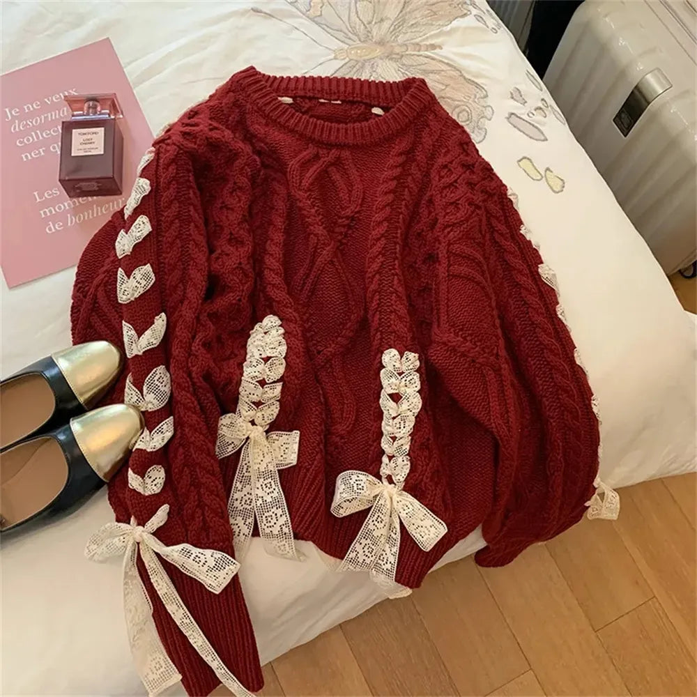 Evelyn - kabelstrikket sweater med bindedetaljer