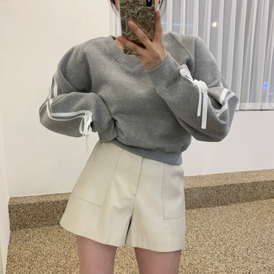Zoe - Smarte shorts med kontraststrimler og sløjfer