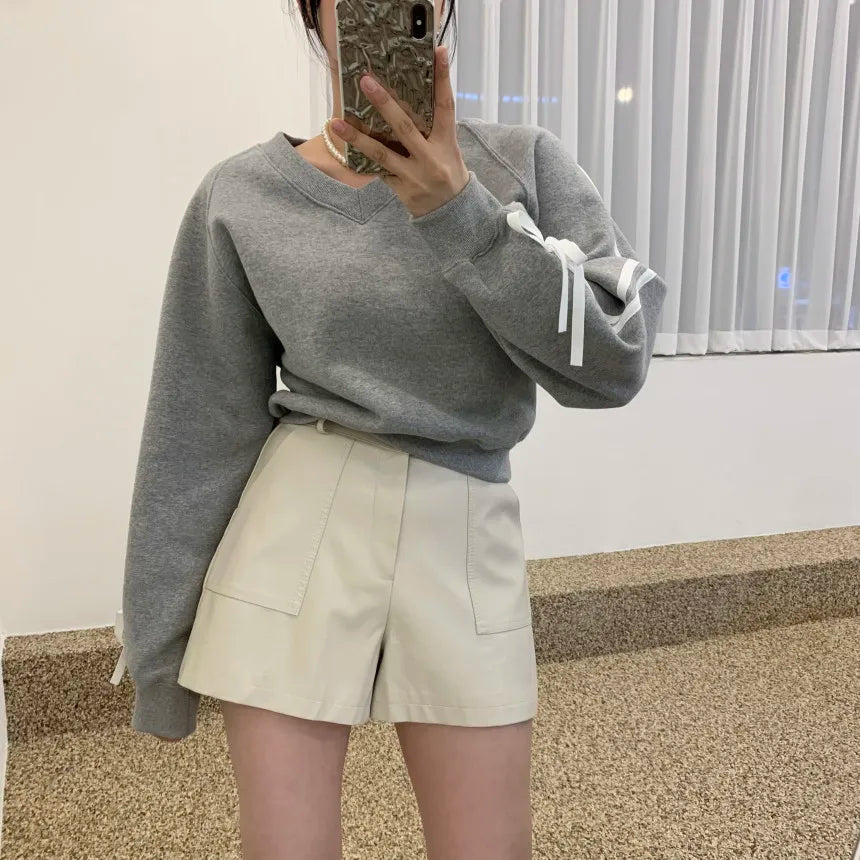 Zoe - Smarte shorts med kontraststrimler og sløjfer