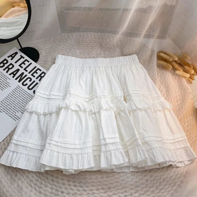 Alba - Lagdelt nederdel med strukturerede flæser